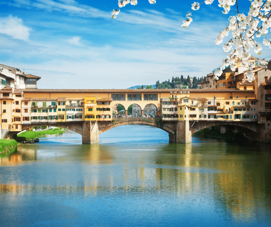 famous bridge Ponte Vecchio over waters of river Arno Florence at spring day, Italy