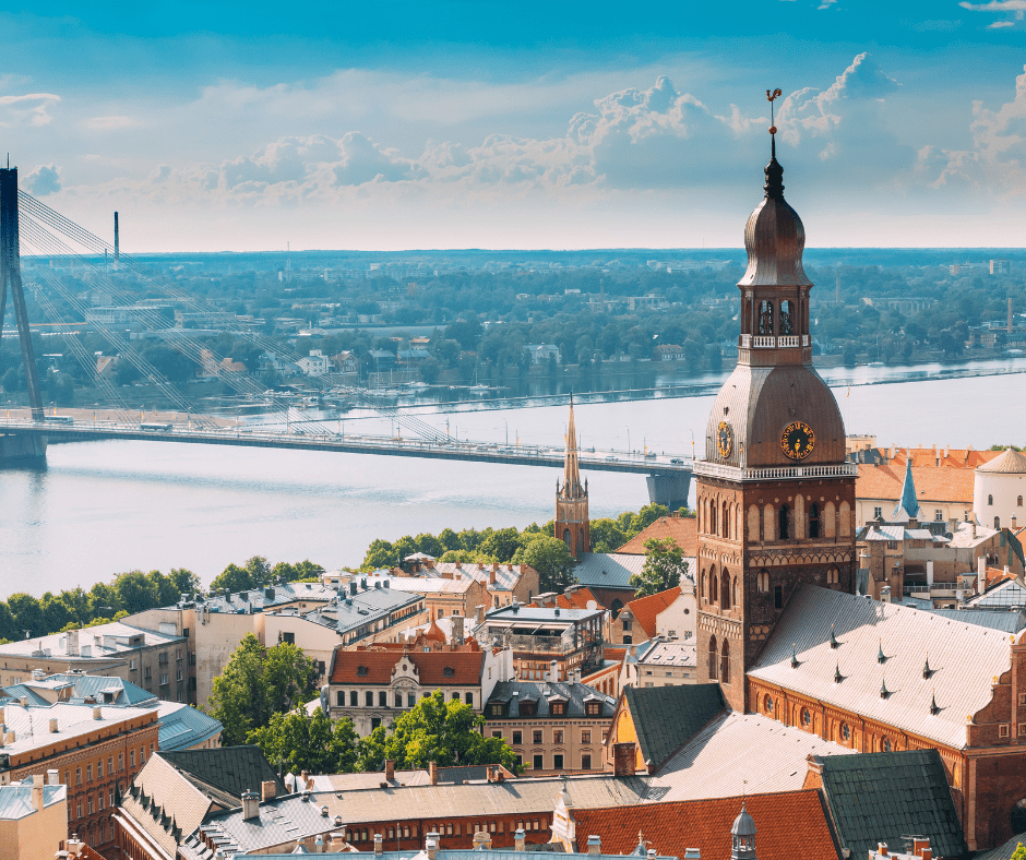 Sunny summer cityscape of Riga, Latvia, showcasing the iconic Riga Dome Cathedral—an architectural gem in top Baltic travel destinations 2025.