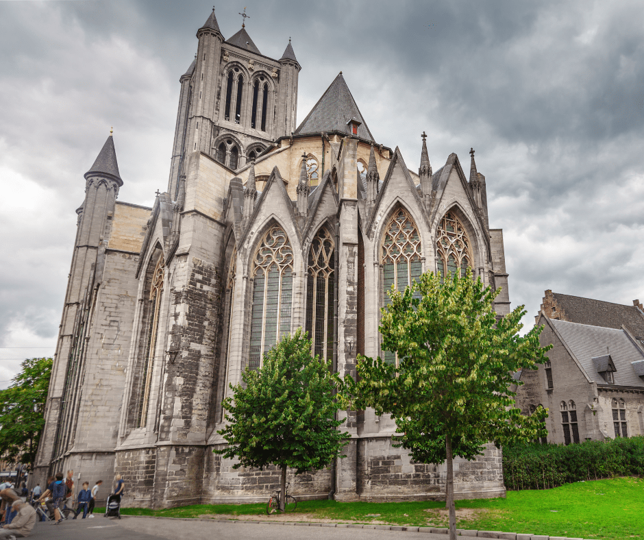 Exterior view of Saint Bavo’s Cathedral in Ghent, Belgium, showcasing its Gothic architecture and ornate stone detailing.