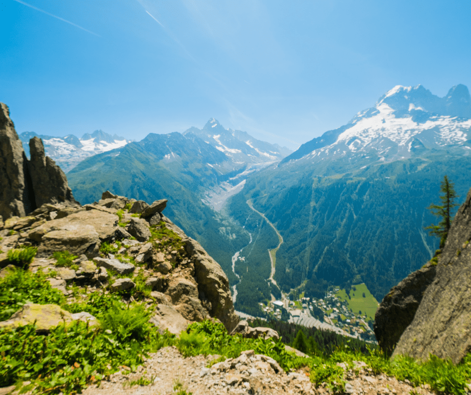 Breathtaking panorama of Mont Blanc, the highest peak in Western Europe, with its snow-covered slopes and towering summit, viewed from the village of Argentière in the French Alps