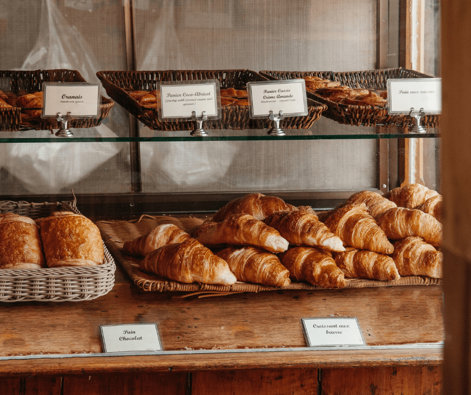 Freshly baked French baguettes on display at a local bakery in France—an example of high-quality carbs enjoyed in moderation as part of the European diet.
