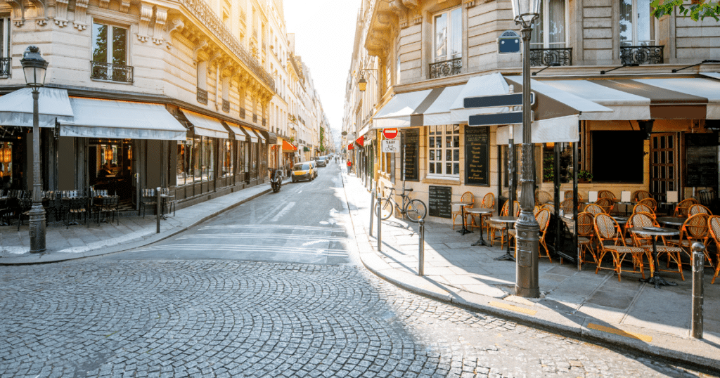 French café/brasserie terrace with tables and menus
