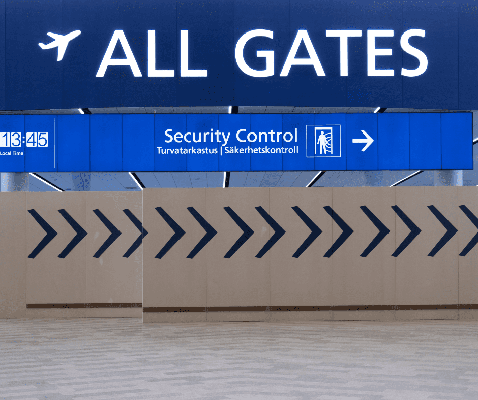  security control checkpoint at an airport gate, symbolizing enhanced border procedures and upcoming requirements like ETIAS.