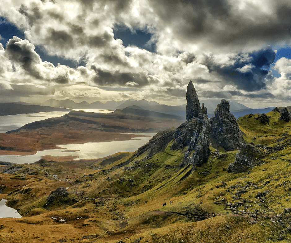 Old Man of Storr surrounded by mist and rugged terrain on the Isle of Skye