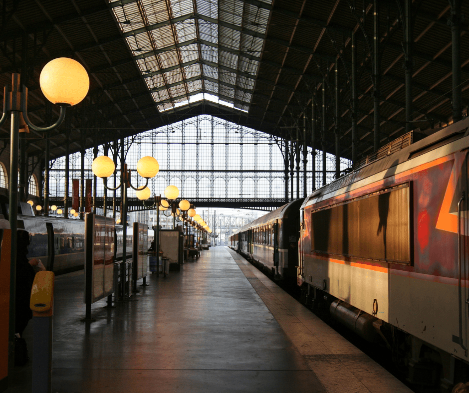 Exterior view of Paris Gare du Nord train station, one of Europe’s busiest rail hubs, featuring historic architecture and travelers entering the main entrance.