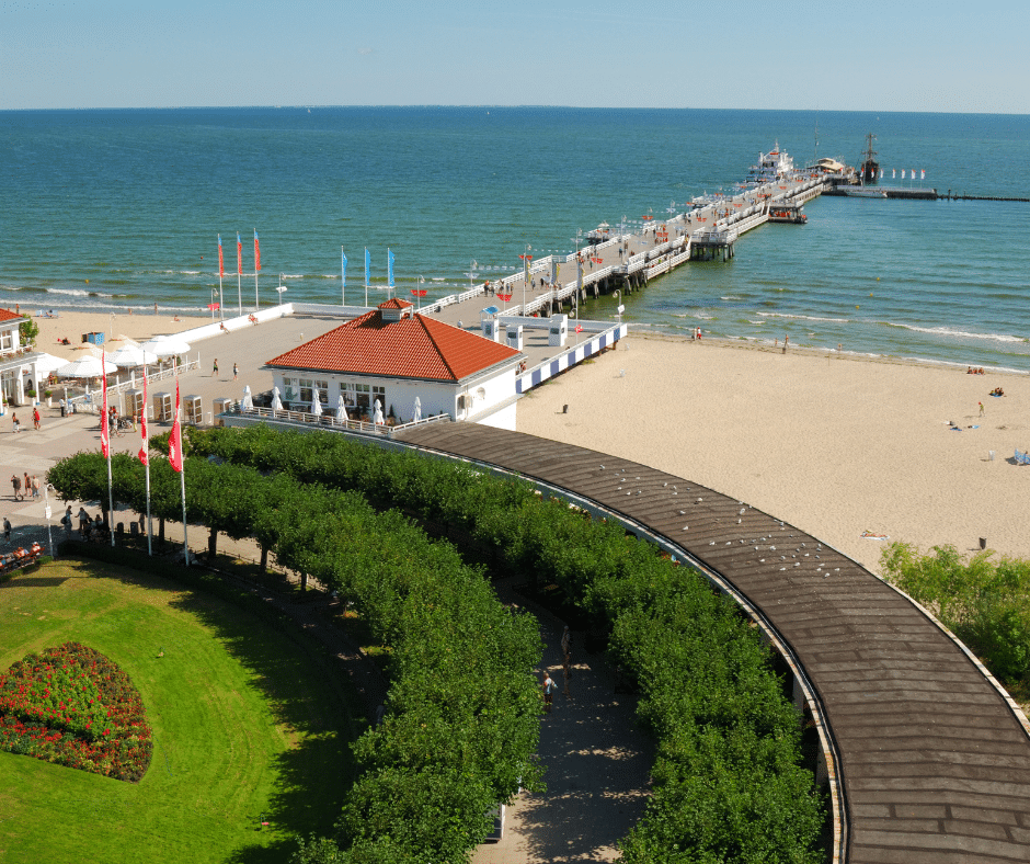 beach and lighthouse in summer sopot, poland